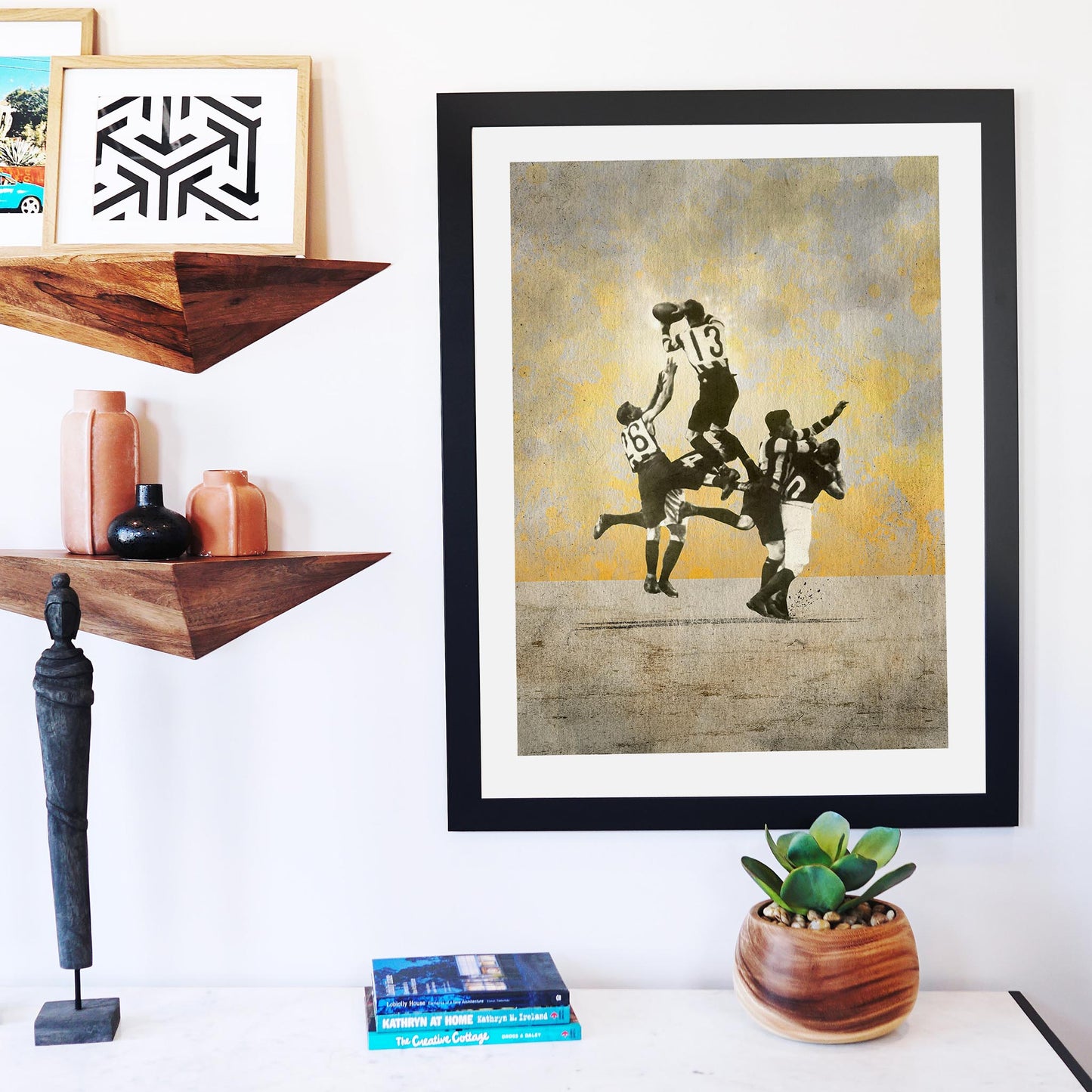 Dick Lee print displayed in modern lounge room — stylish framed football art for home or man cave decor